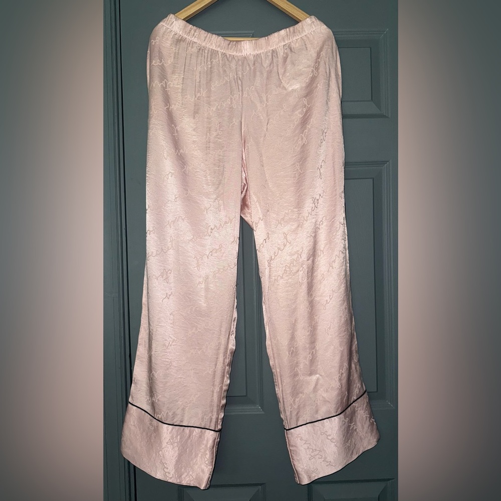 Victoria’s Secret Satin Logo Print Light Pink Pajama Pants.
Size Large